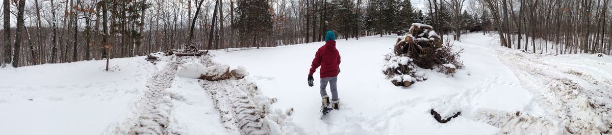 Scenic view of snow covered field