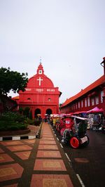 View of red building against clear sky