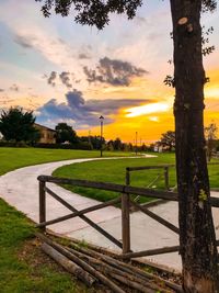 Scenic view of field against sky during sunset