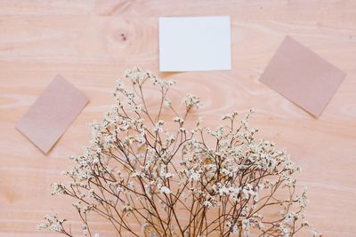 High angle view of white paper on table