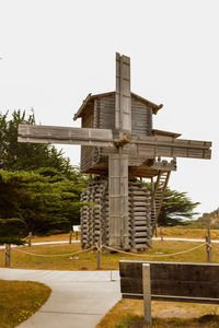 Built structure on field against clear sky