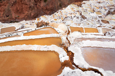 High angle view of salt pools at maras