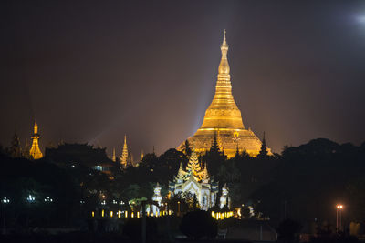 Illuminated shwedagon pagoda at night