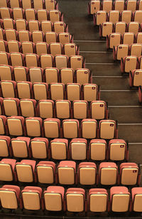 High angle view of empty chairs in auditorium