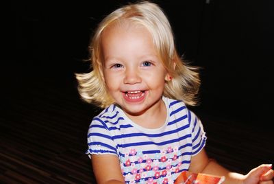 Portrait of smiling girl at home