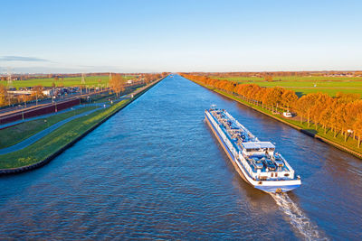 Aerial from a freighter on the amsterdam rijn canal in the netherlands