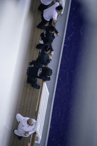 Low section of people on car window