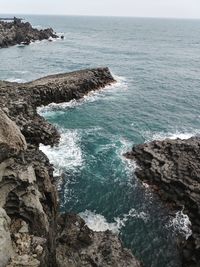 Scenic view of rocks in sea