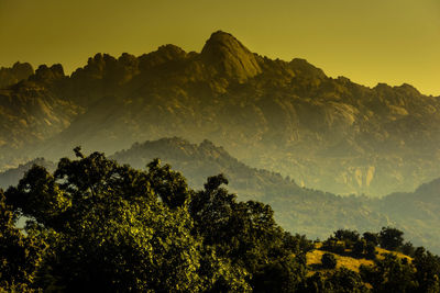 Scenic view of mountains against sky during sunset