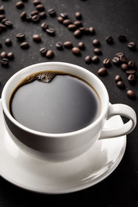 High angle view of coffee cup on table