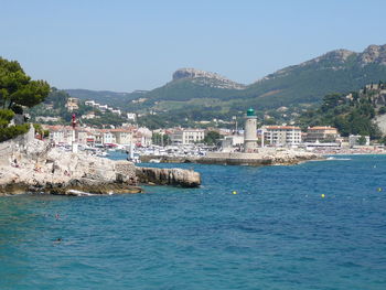 Scenic view of sea against blue sky