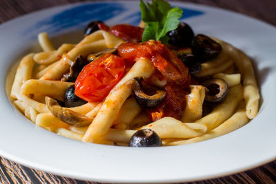 Close-up of pasta in plate on table