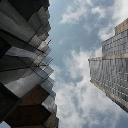 Low angle view of buildings in city against sky