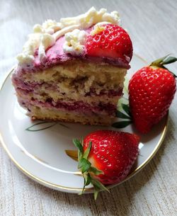 Close-up of strawberries in plate on table