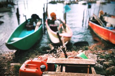 Boats moored in lake trasimeno