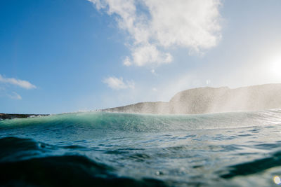 Surface level of sea against sky