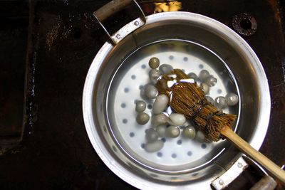 High angle view of silk cocoons in water