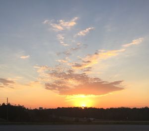 Scenic view of silhouette landscape against sky during sunset