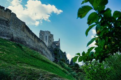 Low angle view of beckov castle against sky