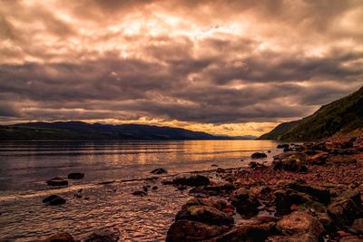 Scenic view of sea against sky during sunset