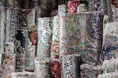 Full frame shot of various carpets for sale at market