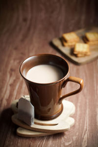 Close-up of coffee cup on table