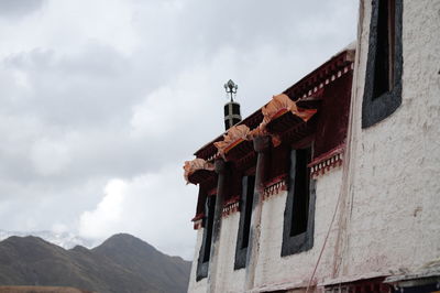 Low angle view of old building against sky