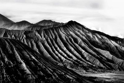 Scenic view of volcanic landscape against sky