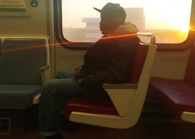 Man sitting in train