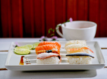 High angle view of sushi served in plate on table