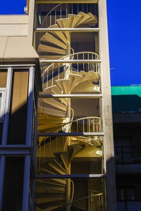 Landscape with a spiral staircase