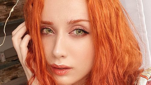 Close-up portrait of young woman