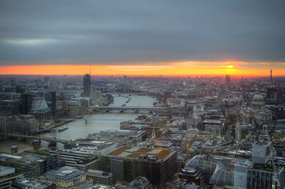 High angle view of city at sunset