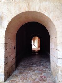 Archway leading towards building