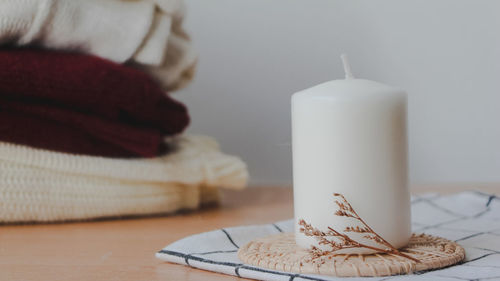 Close-up of candle on table