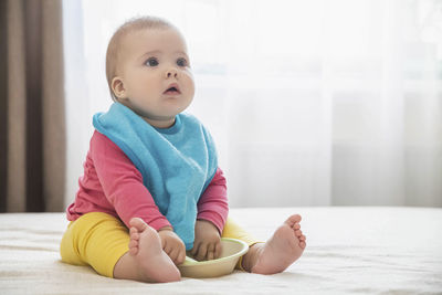 Portrait of cute baby boy at home