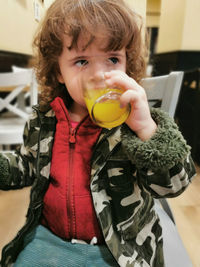 Portrait of cute boy holding ice cream