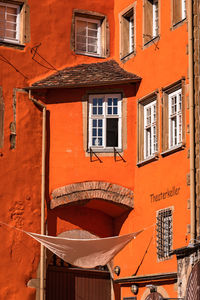 Low angle view of orange building