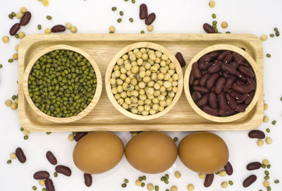 High angle view of eggs in container on table
