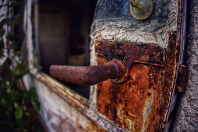 Close-up of old rusty metal door