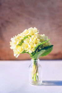 Close-up of white flower vase on table