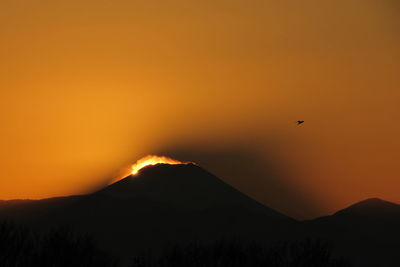 Scenic view of mountains at sunset