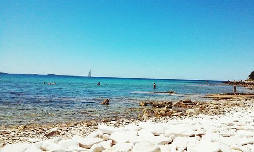 Scenic view of sea against clear sky