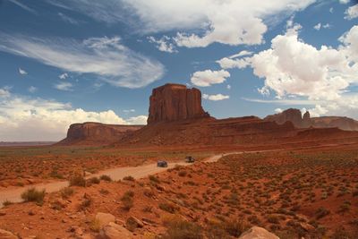 Rock formations in desert against sky