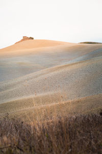 View of desert against clear sky