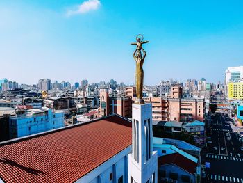 Cityscape against blue sky