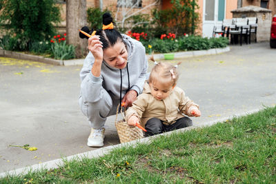 Grandparents in kids life, grandparents teach children. senior woman grandmother and little toddler