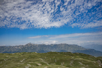 Scenic view of snowcapped mountains against sky