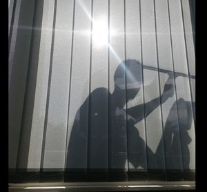 Close-up of curtain against window