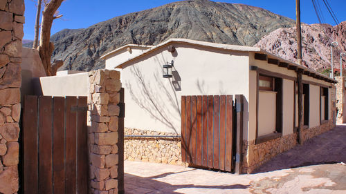 Exterior of building with mountain in background